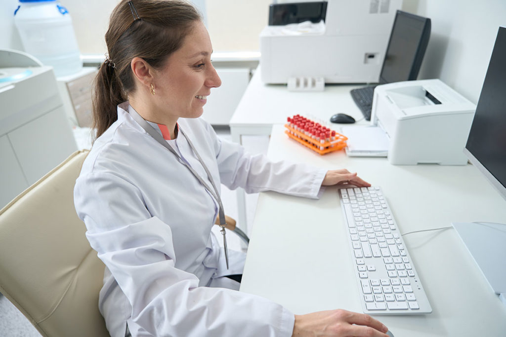 woman-making-printout-of-the-results